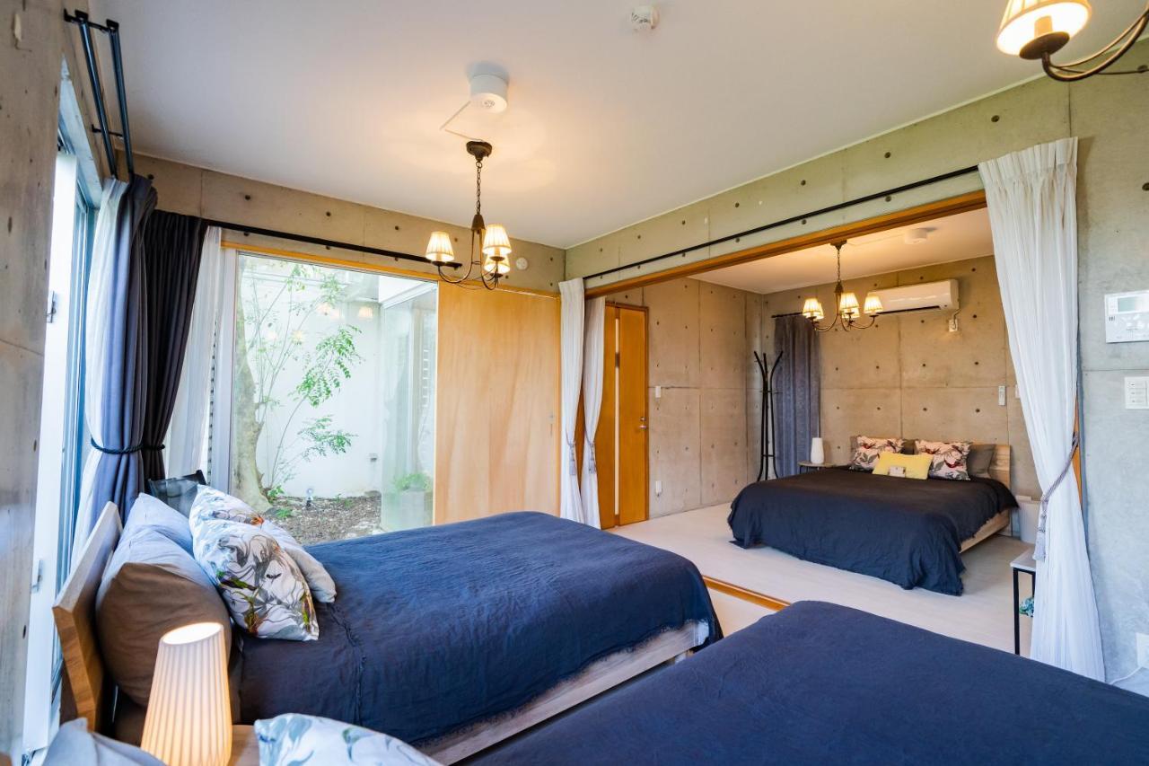 Em Tree House Villa Uruma Exterior foto